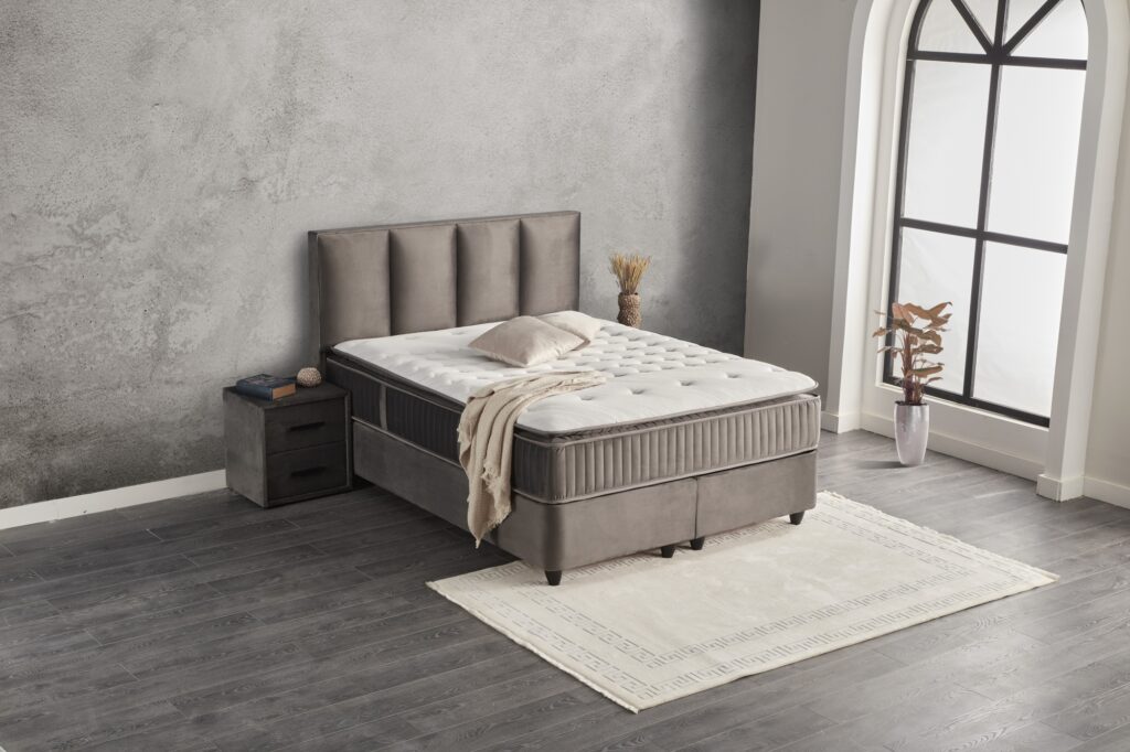 mīkstas apdares gultas